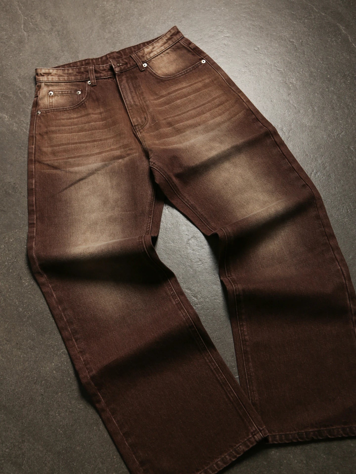 Heavy washed vintage brown denim jeans front view, faded cacao colorway